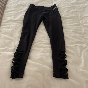 girls black leggings with mesh & detailing at the bottom